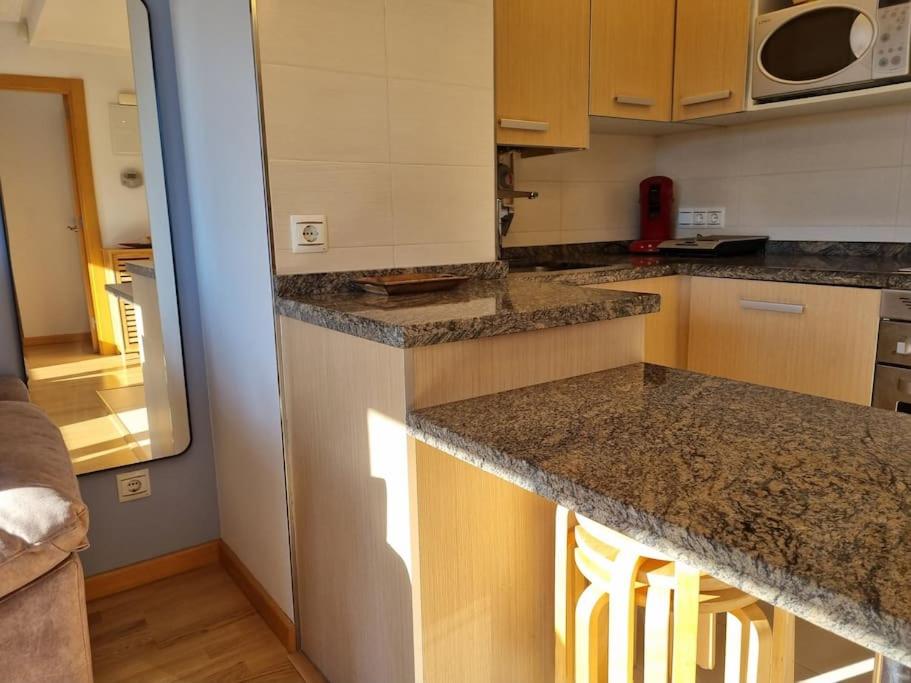 20A01 - Precioso apartamento con piscina y garaje - Housity