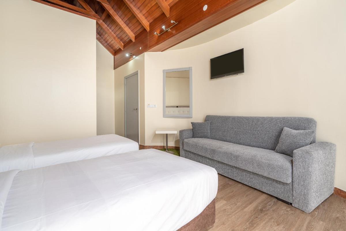 Uma cama ou camas num quarto em TarmarPlace