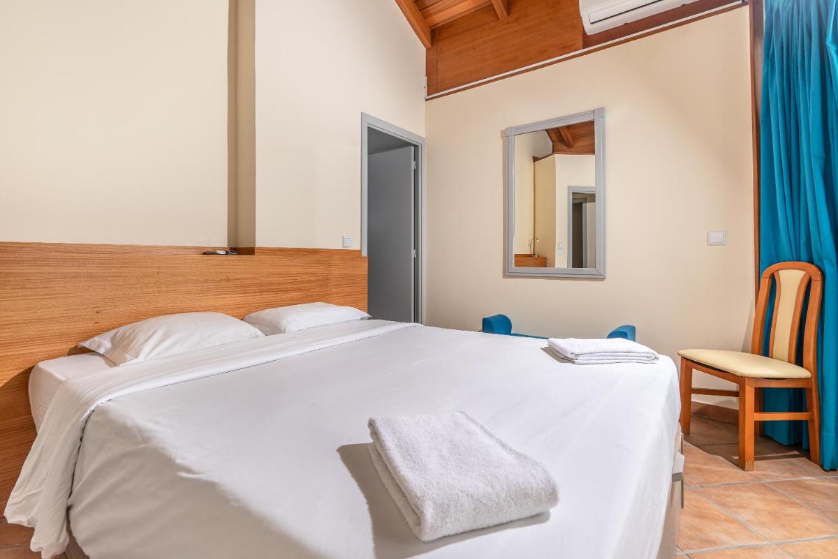 Uma cama ou camas num quarto em TarmarPlace