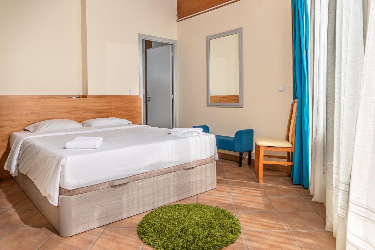 Uma cama ou camas num quarto em TarmarPlace