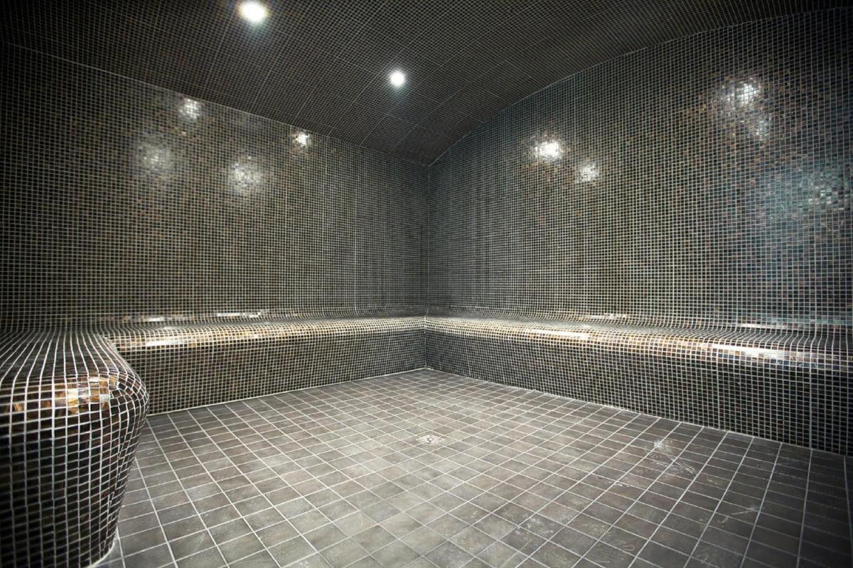 Salle de bains dans l'établissement Le Calgary