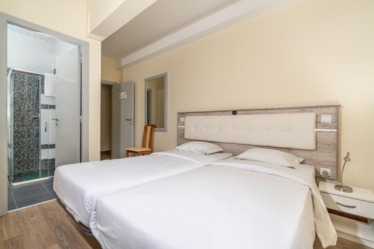 Uma cama ou camas num quarto em TarmarPlace