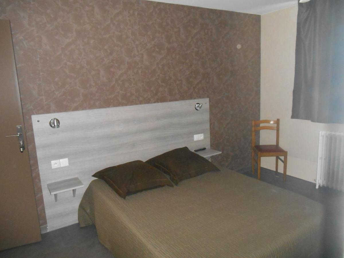 Un ou plusieurs lits dans un hébergement de l'établissement Hôtel La Tente Verte