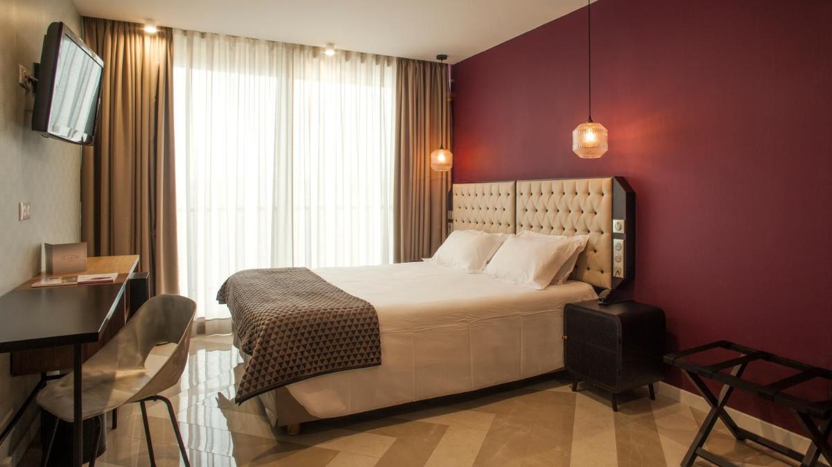 Un ou plusieurs lits dans un hébergement de l'établissement Hotel La Pietra Restaurant & Spa