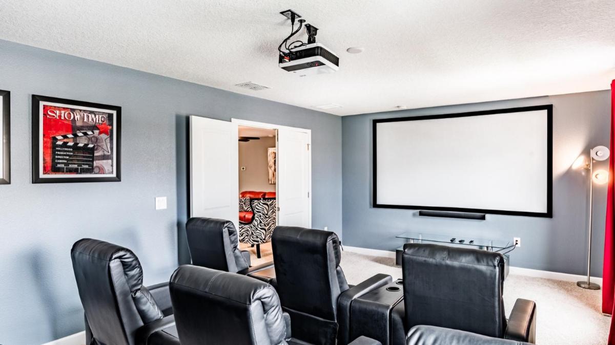 Immersive Magical Theater Room Cleveland Retreat - Housity