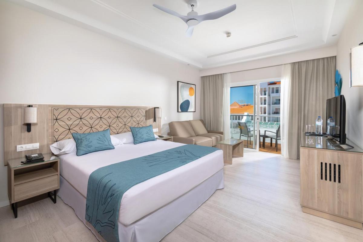 Uma cama ou camas num quarto em Hotel Riu Madeira - All Inclusive