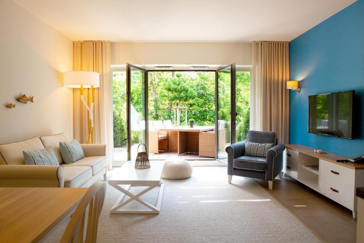 Ein Sitzbereich in der Unterkunft Aalernhüs hotel & spa