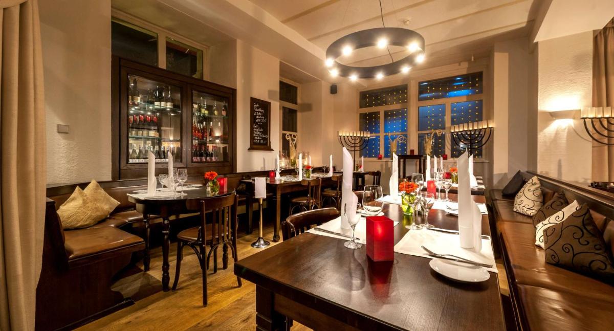 Ein Sitzbereich in der Unterkunft Maison Messmer - ein Mitglied der Hommage Luxury Hotels Collection