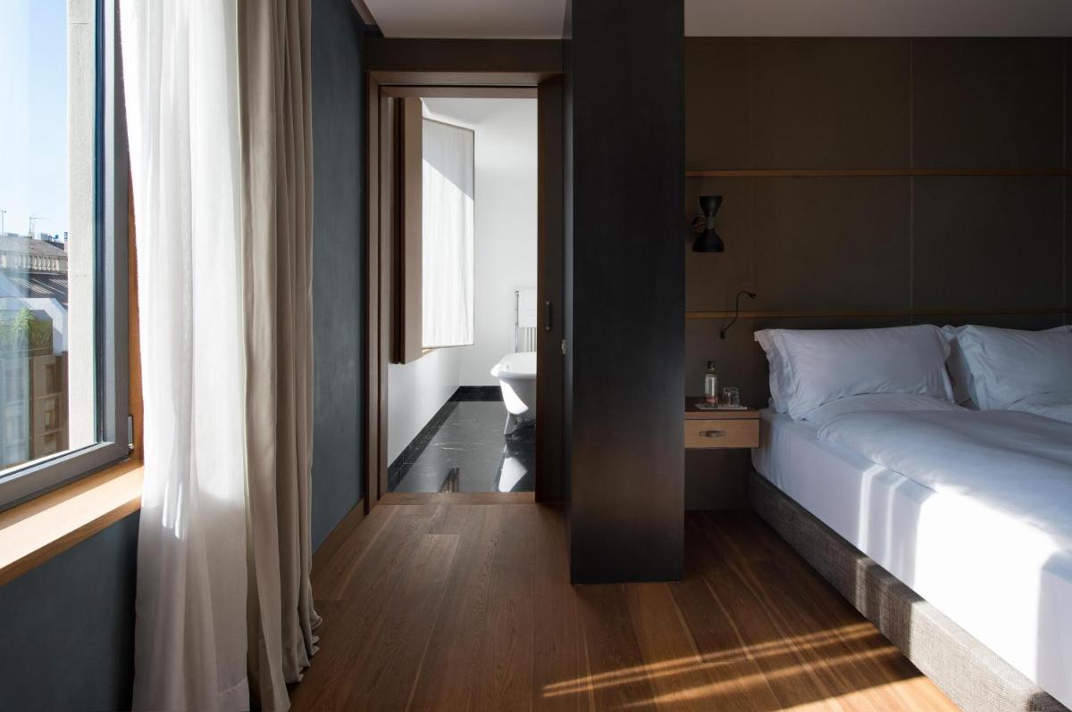 Cama o camas de una habitación en Alma Barcelona GL