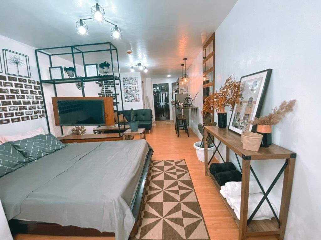 Black & Bold - 1BR Condo 50mbpsWIFI near SM Marilao - Housity