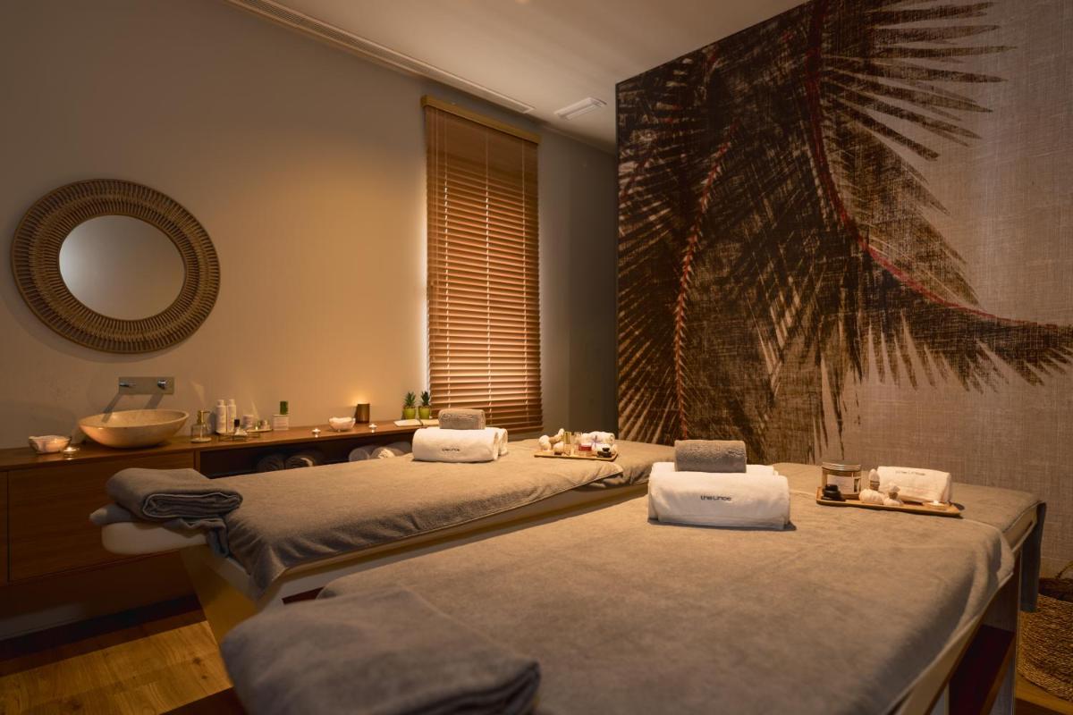Uma cama ou camas num quarto em The Lince Nordeste