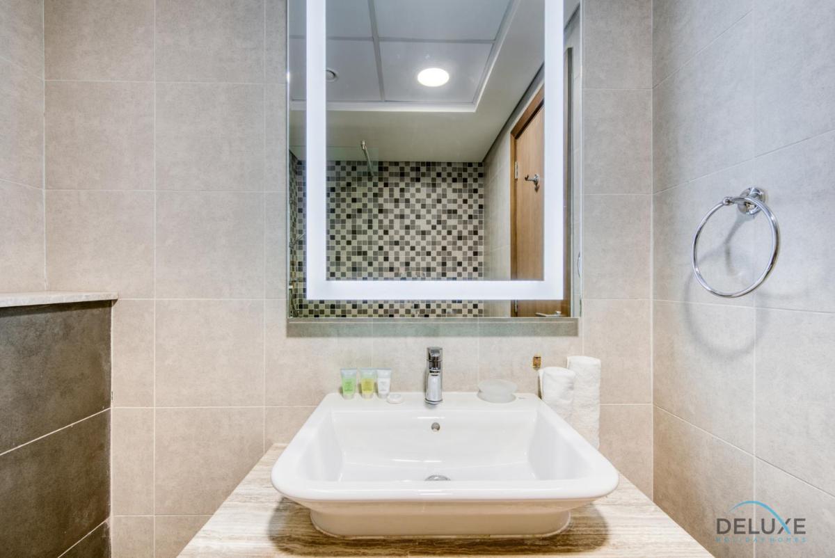Expansive 2BR at Azizi Aliyah Dubai Healthcare City by Deluxe Holiday Homes - Housity