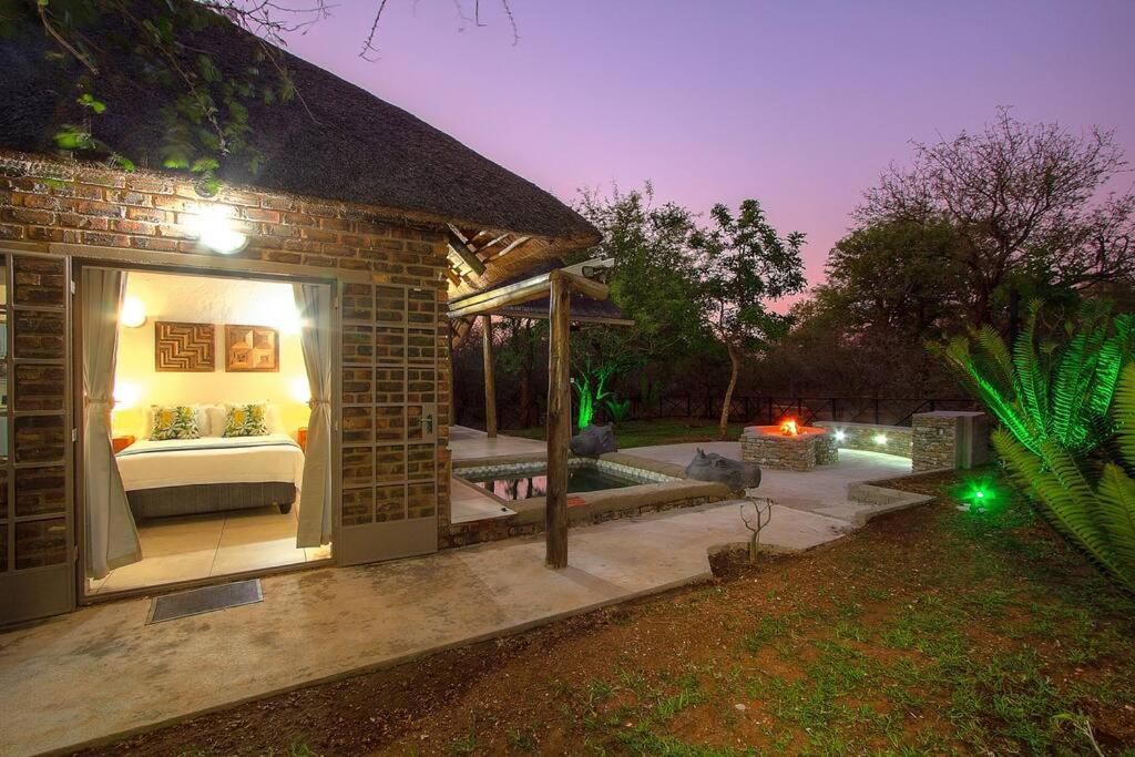 Eye of Kruger - Spacious holiday home with splash pool and boma - Housity