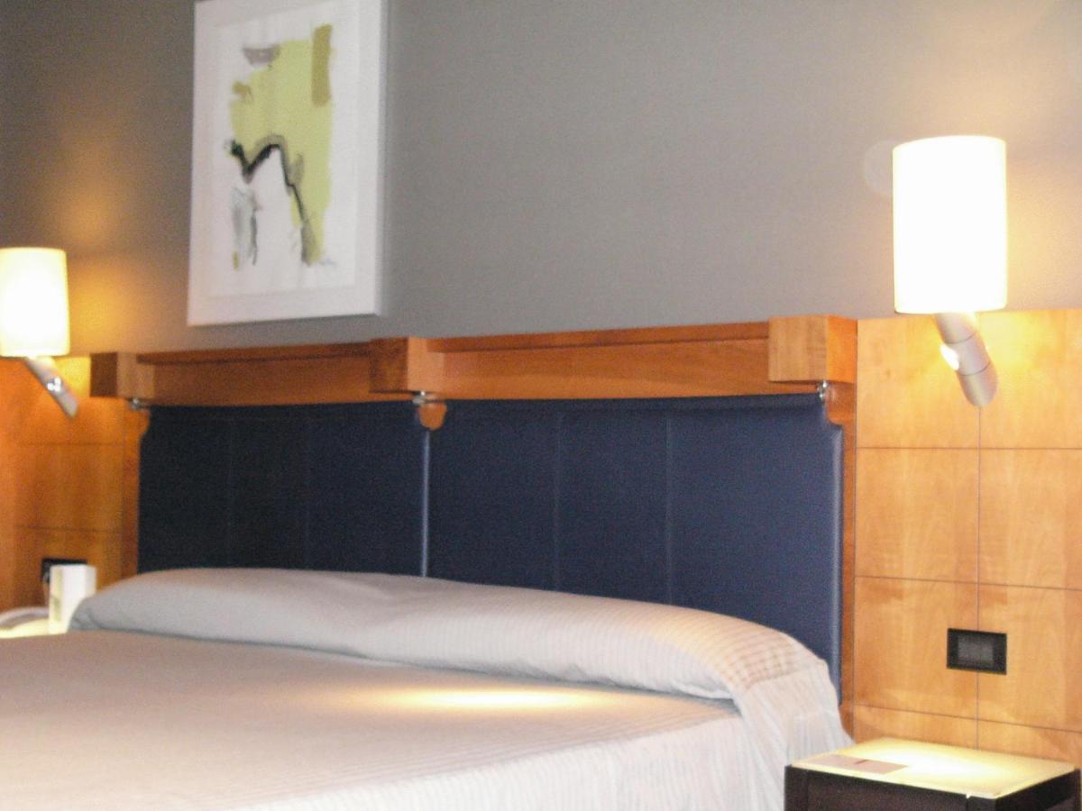 Cama o camas de una habitación en Gran Hotel Lakua