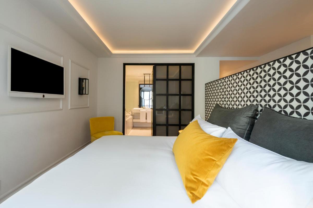 Cama o camas de una habitación en Serras Barcelona