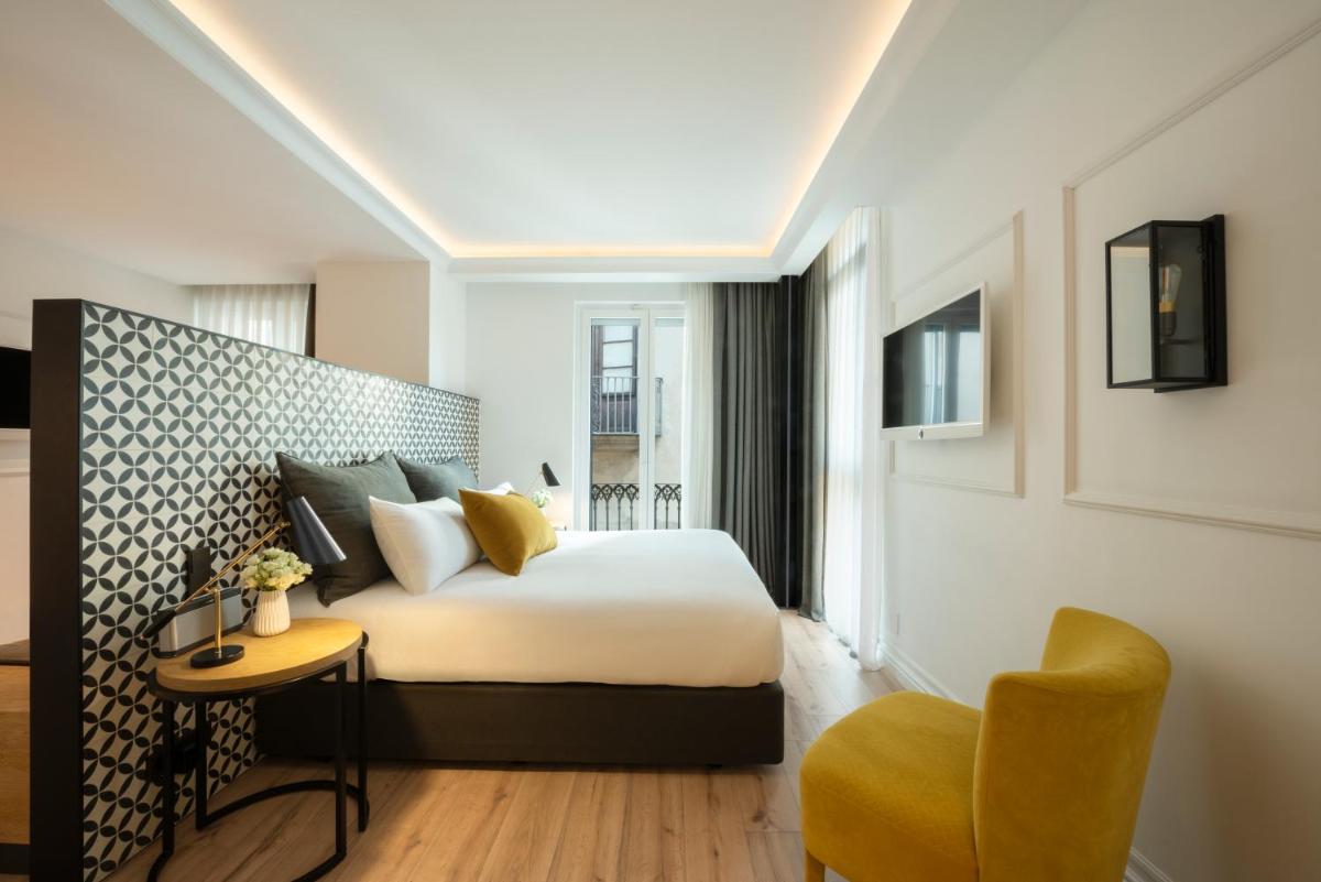 Cama o camas de una habitación en Serras Barcelona