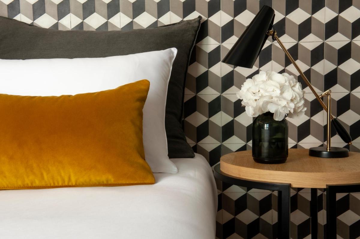 Cama o camas de una habitación en Serras Barcelona