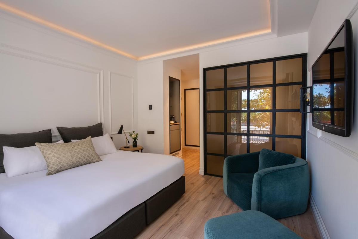 Cama o camas de una habitación en Serras Barcelona