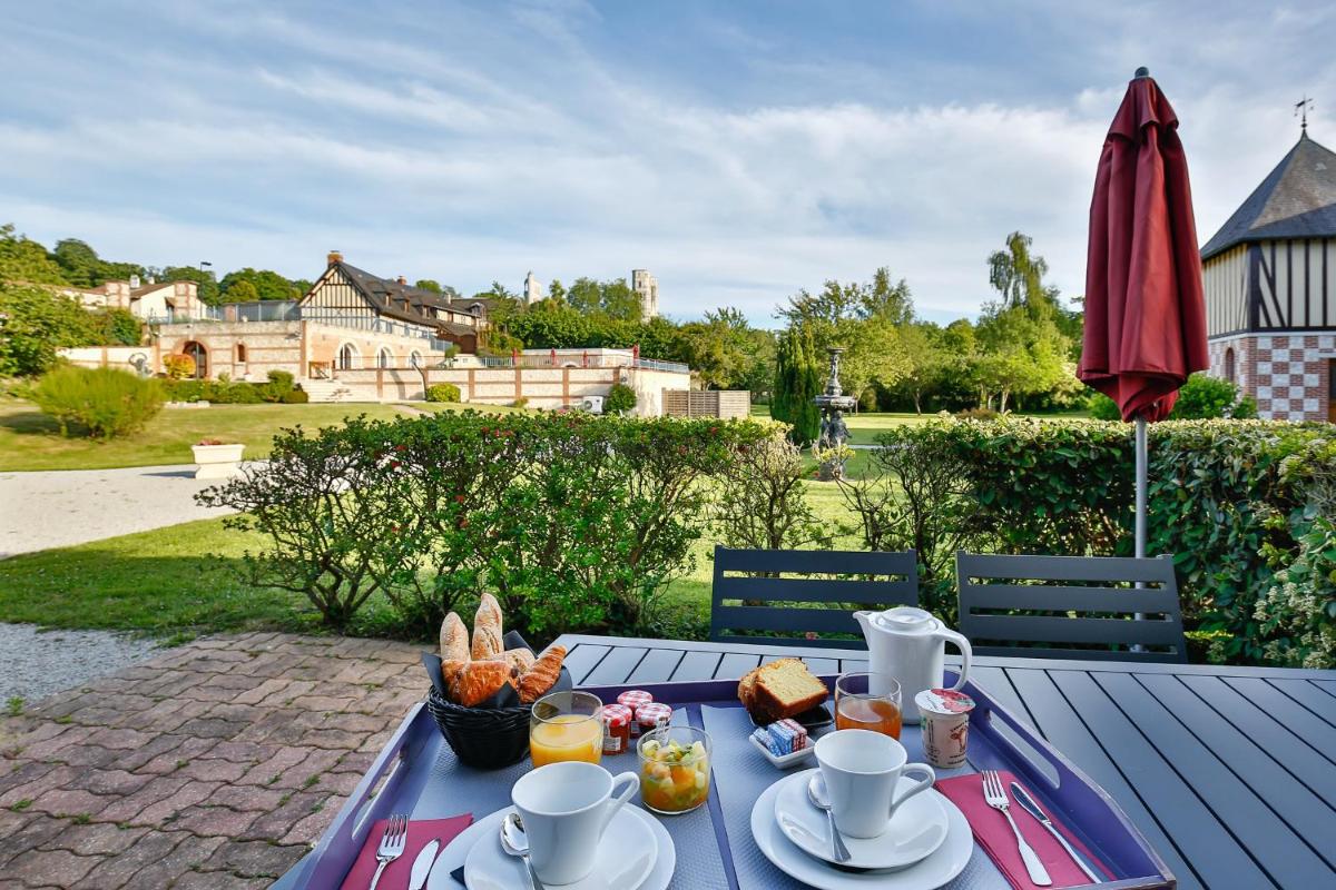 Jardin de l'établissement Demeures & Châteaux Hôtel Domaine le Clos des Fontaines
