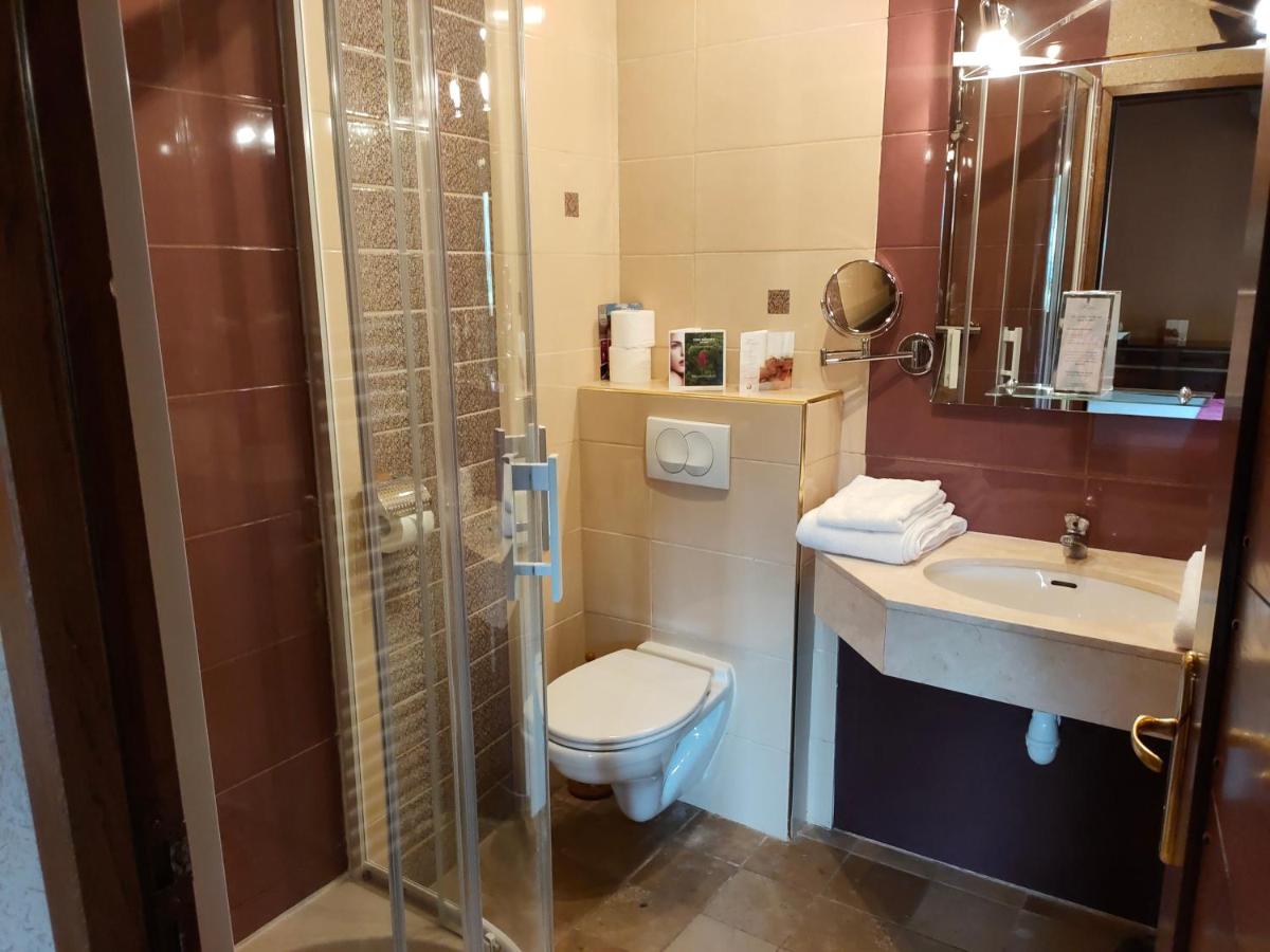 Salle de bains dans l'établissement Demeures & Châteaux Hôtel Domaine le Clos des Fontaines