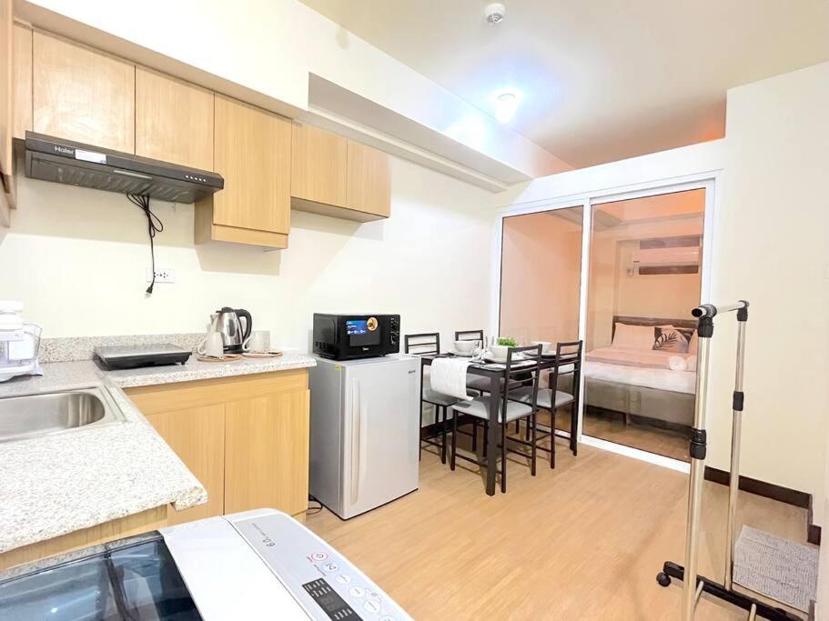 Best Location and Spacious 1BR w/ WI-FI at Brixton Place, Pasig - Housity
