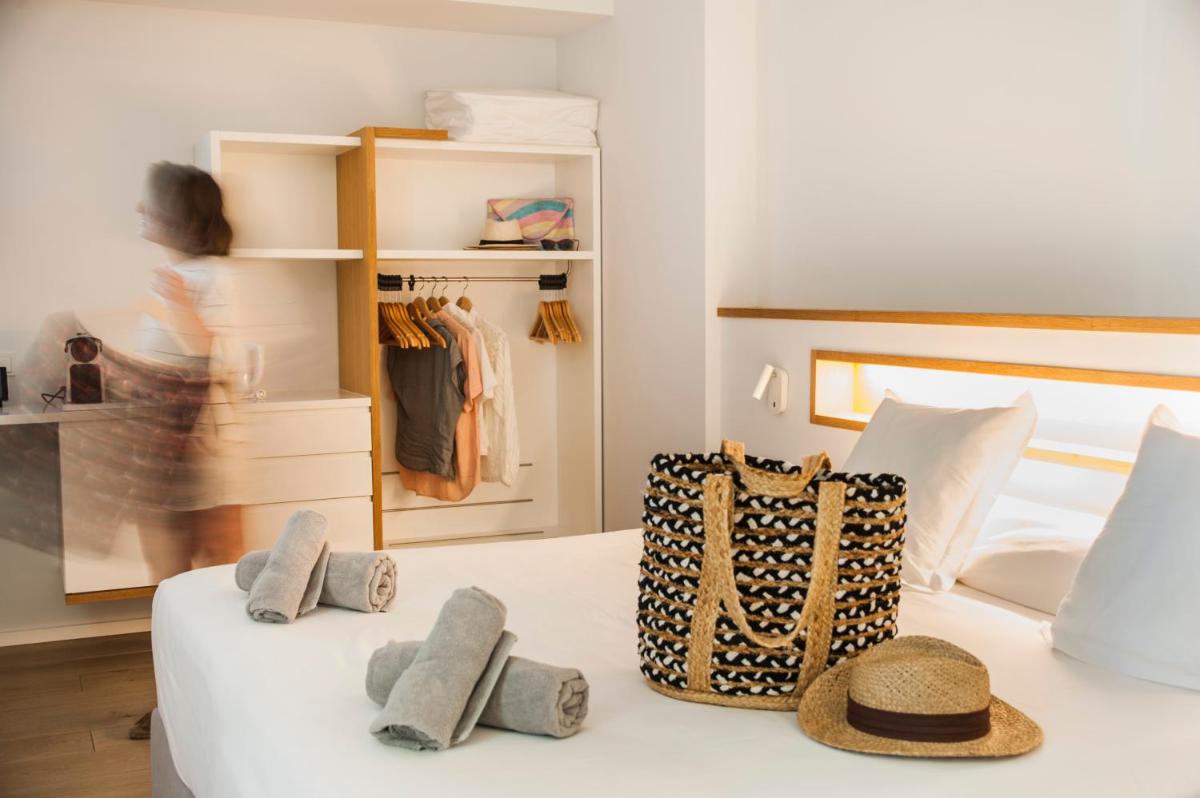 Cama o camas de una habitación en Hotel Anfora Ibiza
