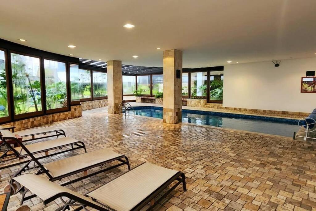 Suite ejecutiva parque La Carolina con piscina, spa, gym - Housity