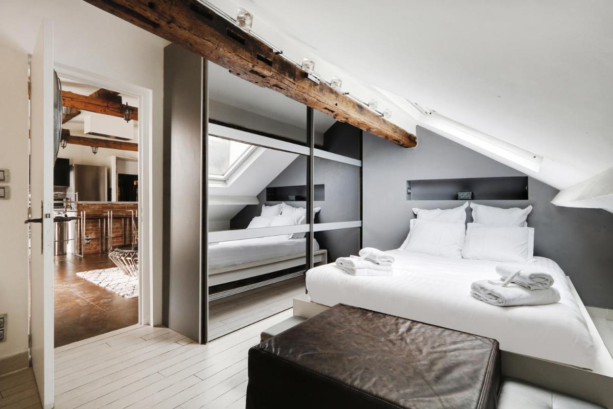 Suitetrails - Pick A Flat's Apartments in Le Marais - Rue Saint Merri