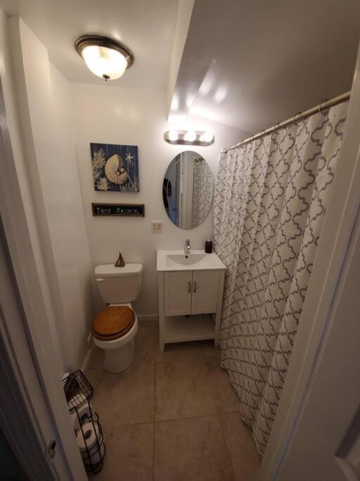 Beachy Bay Breeze Bungalow 2BR with parking and close to many amenities. - Housity