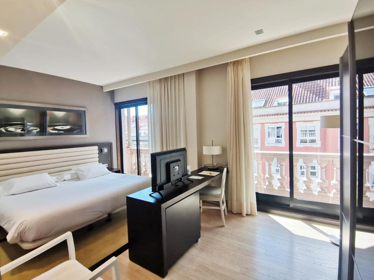 Cama o camas de una habitación en Hotel Bienestar Moaña
