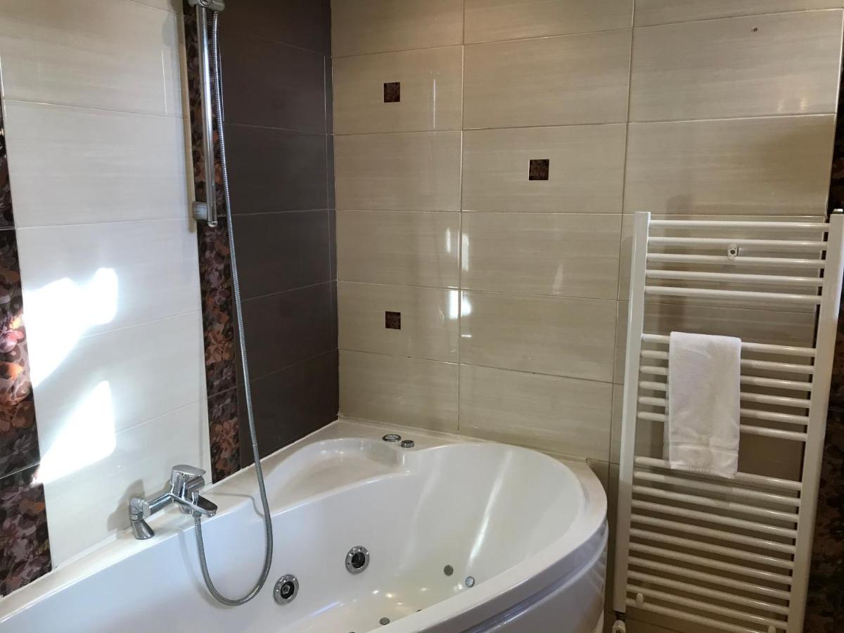 Salle de bains dans l'établissement Demeures & Châteaux Hôtel Domaine le Clos des Fontaines