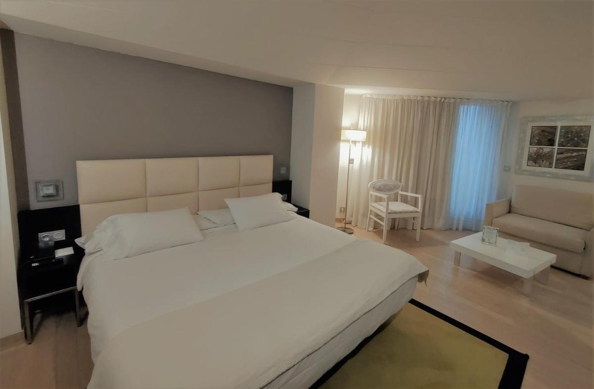 Cama o camas de una habitación en Hotel Bienestar Moaña
