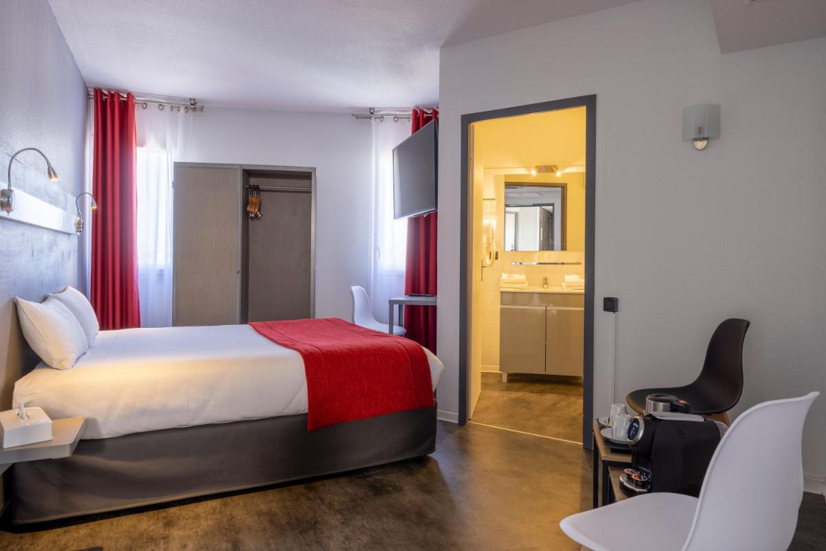 Un ou plusieurs lits dans un hébergement de l'établissement The Originals City, Hôtel Les Dômes, Perpignan Sud Saleilles