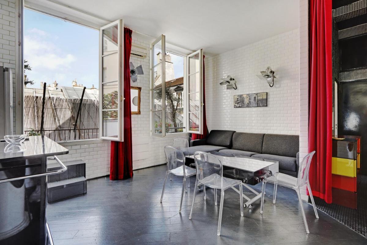 Suitetrails - Pick A Flat's Apartments in Le Marais - Rue Saint Merri