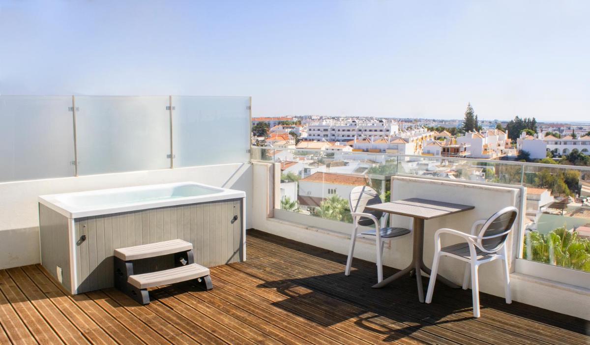Uma varanda ou terraço em AP Maria Nova Lounge - Adults Friendly