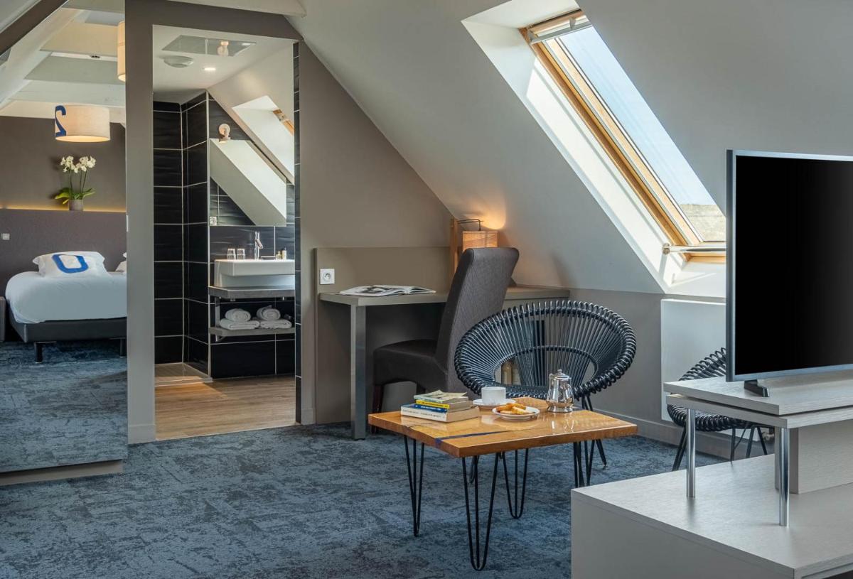 Un ou plusieurs lits dans un hébergement de l'établissement Hostellerie de la Pointe Saint-Mathieu - SPA & Restaurant