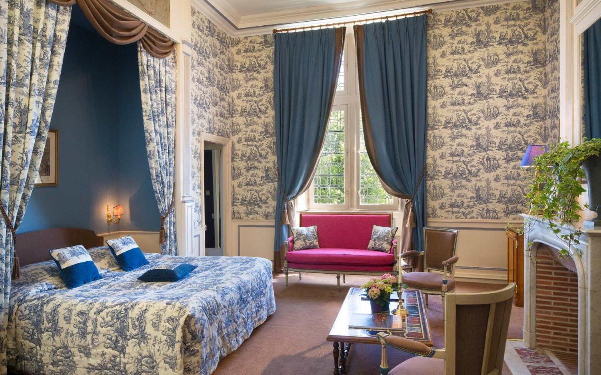 Un ou plusieurs lits dans un hébergement de l'établissement Château de Noizay - ChâteauZen