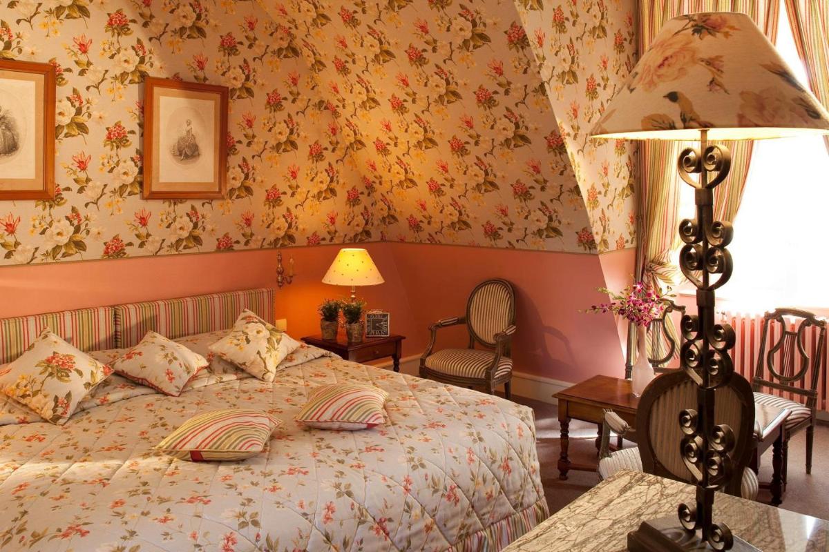 Un ou plusieurs lits dans un hébergement de l'établissement Château de Noizay - ChâteauZen