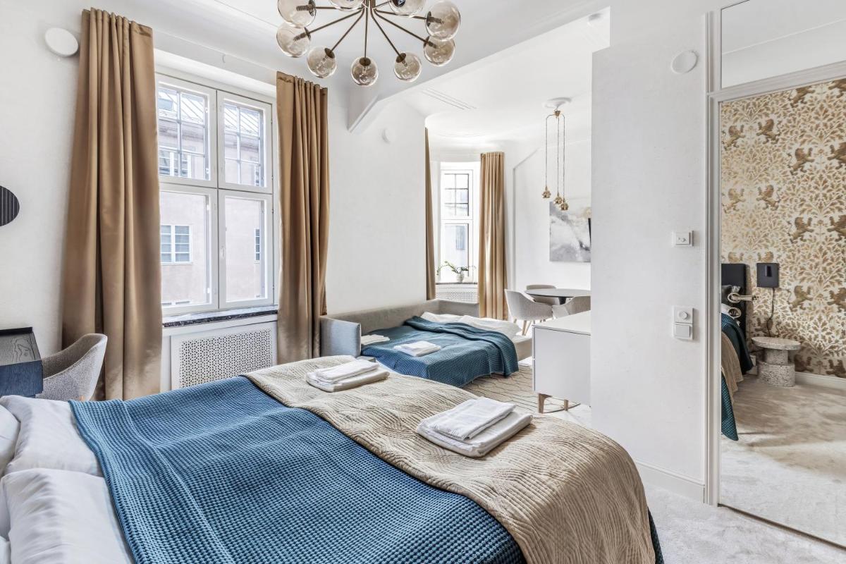 WeHost Marble and Brands in the Heart of Helsinki @Vuorikatu 8 - Housity