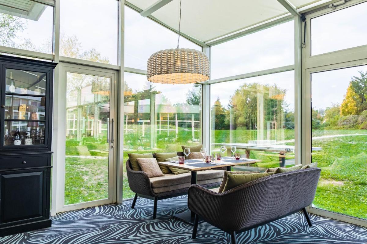 Jardin de l'établissement Novotel Senart Golf De Greenparc