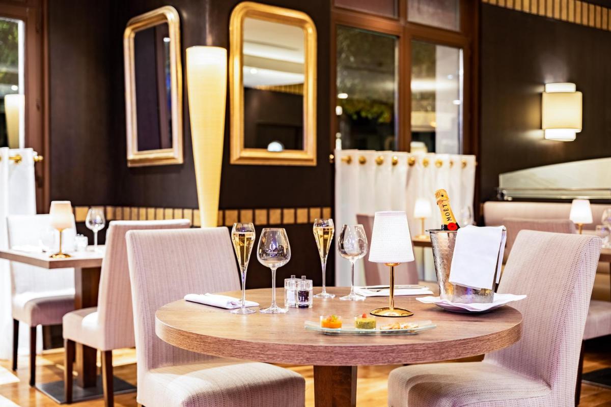 Coin salon dans l'établissement Relais Spa Val d'Europe