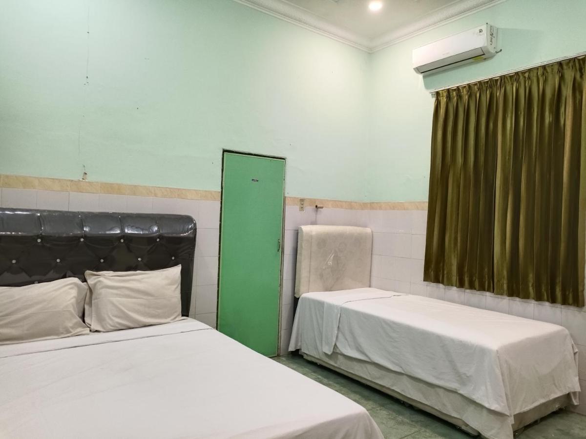 Suitetrails - OYO 91874 Kisaran Residence Syariah