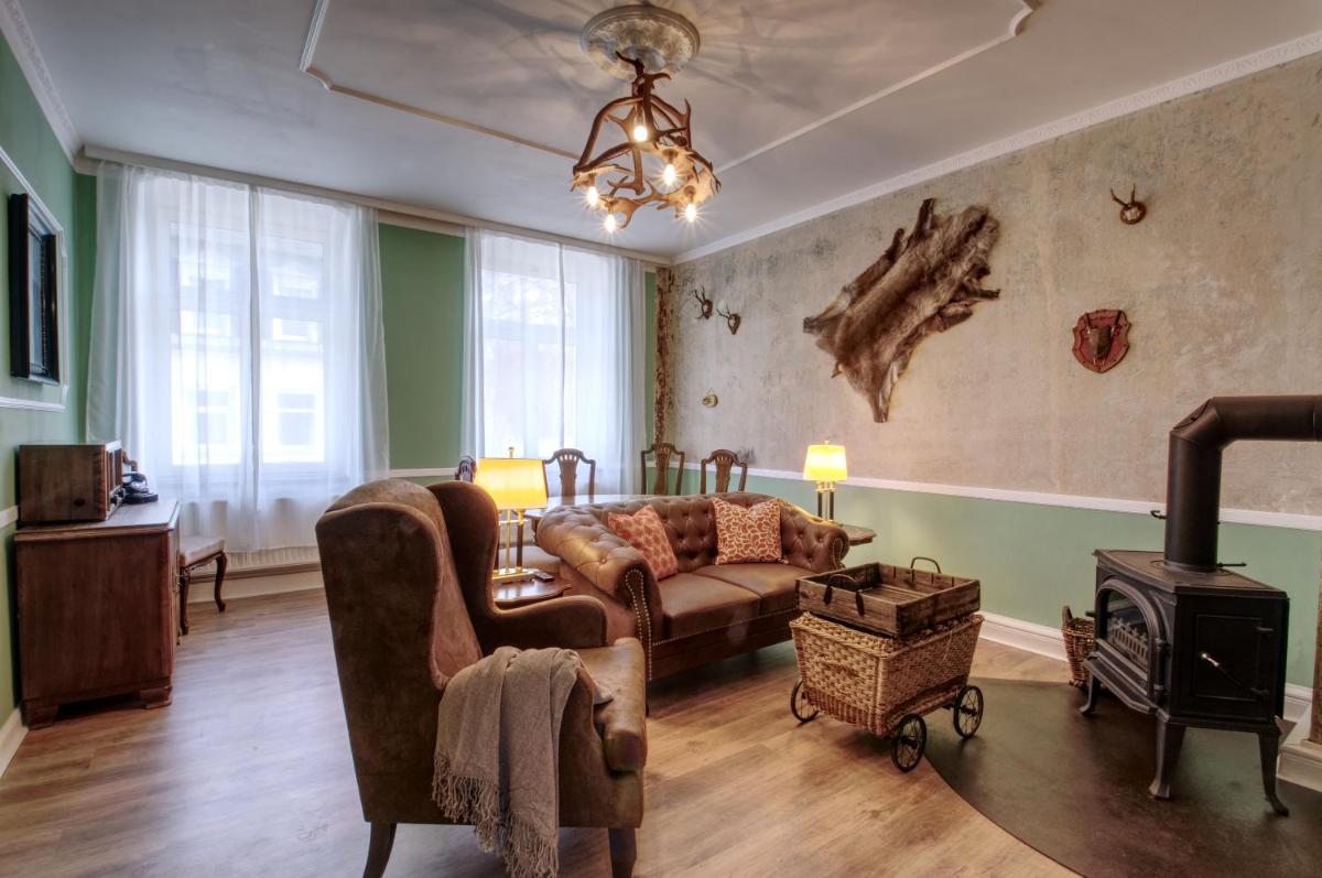 Ferienwohnung Herrenzimmer mit Kamin und Terrasse - Housity
