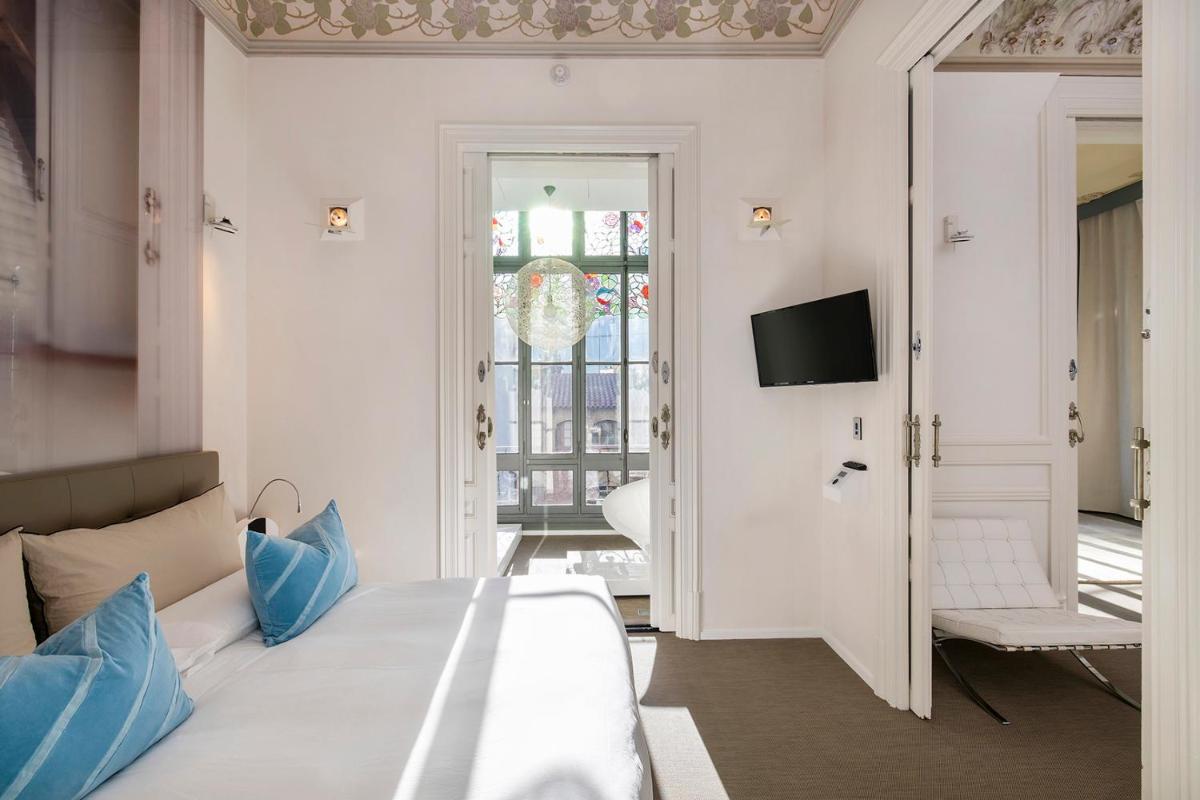 Cama o camas de una habitación en El Palauet Royal Suites