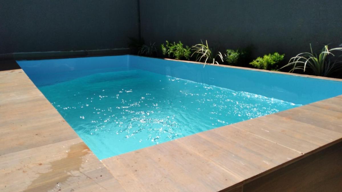 Casa aconchegante com piscina e bem localizada - Housity