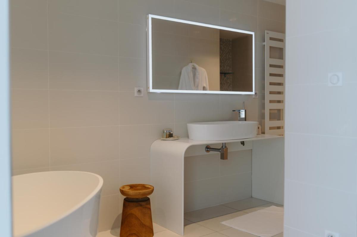 Salle de bains dans l'établissement Le Meez