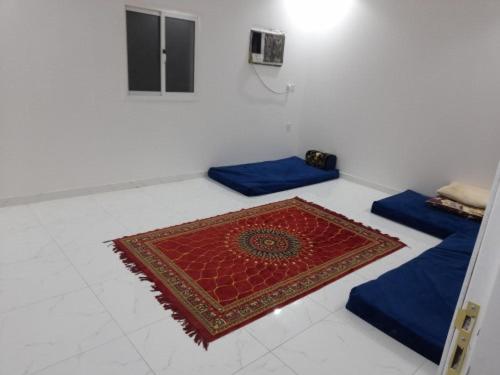 غرفة بمراتب أرضي في سكن مشترك نظام عزاب للذكور فقط - Housity