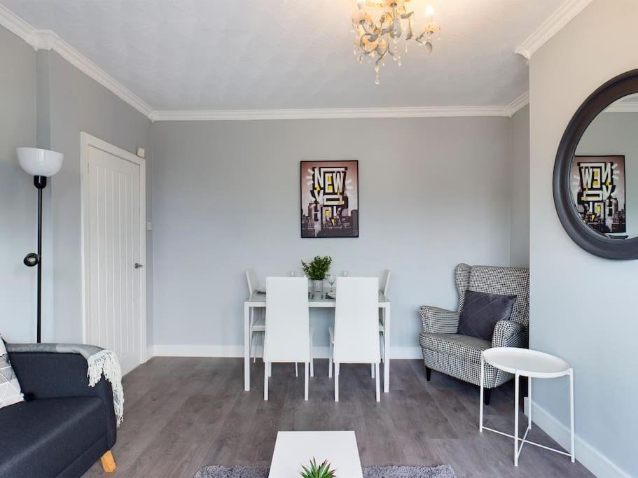 Stunning Family Home with Comfortable Surroundings by Our Home Short Stays ideally situated within Greater Manchester - Housity