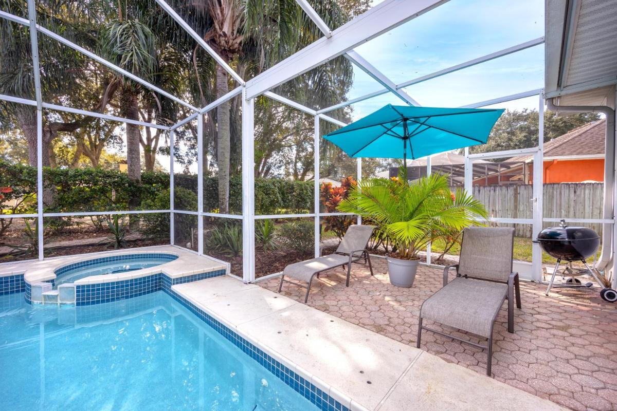 Palm Harbor Paradise - Lovely Home with Pool & Hot Tub - Housity