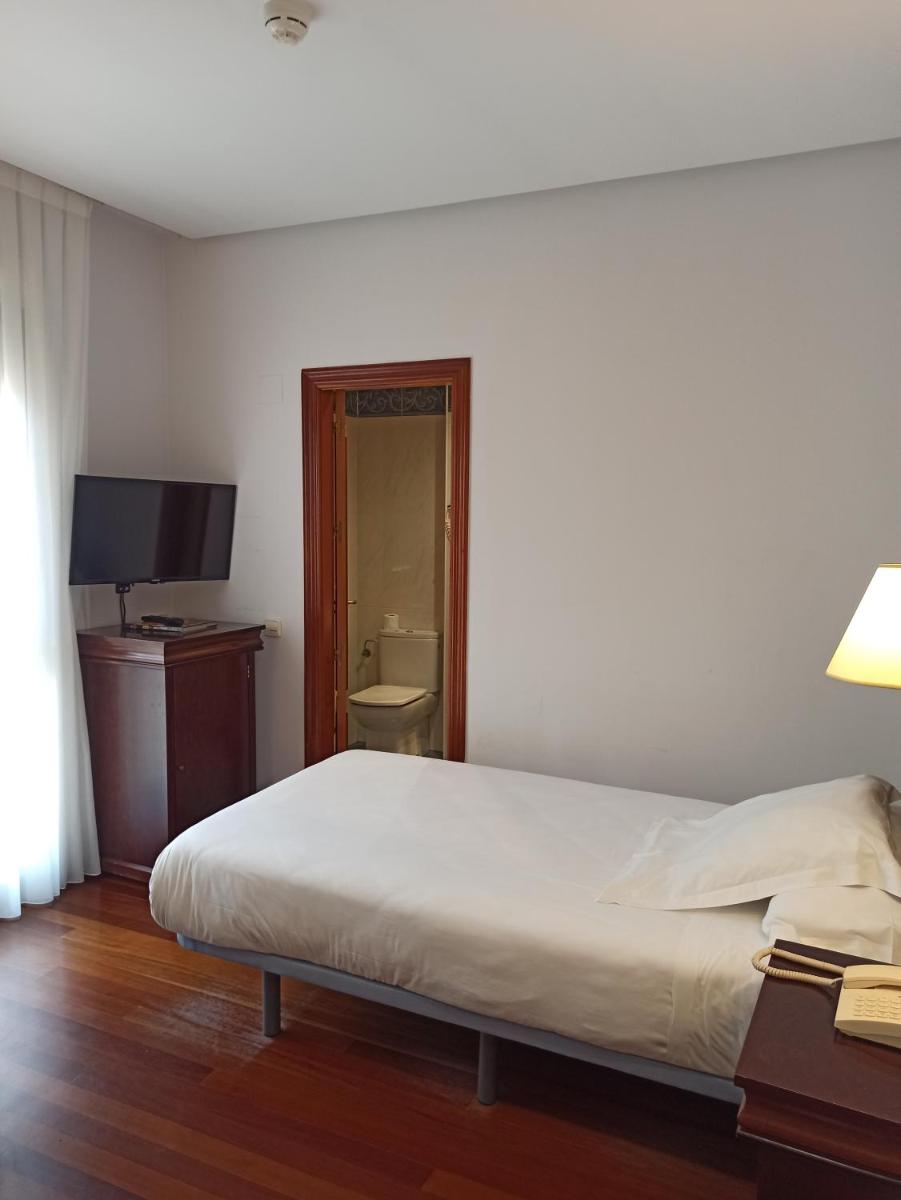 Cama o camas de una habitación en ARVA Spa París